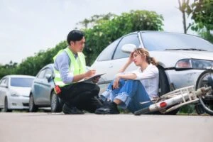 cyclist talking to cops after an accident