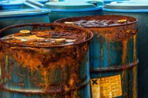 Corroded barrels containing chemicals involved in toxic exposure