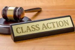 A name plate belonging to a Las Vegas mass tort and consumer class action lawyer is placed near a gavel.
