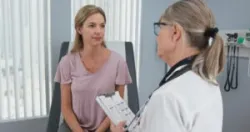 A woman speaks with her OBGYN. Contact a Culver City malpractice lawyer.