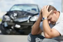 man grieving after accident