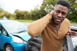 a man with whiplash after a car accident