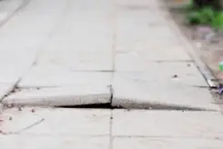 close-up of damaged sidewalk