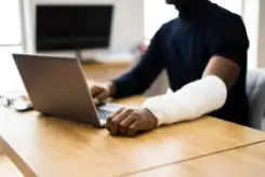injured worker filling out a claim online