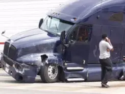 man calling for help after a truck accident