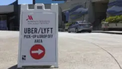 Uber and Lyft street sign outside of a Marriott