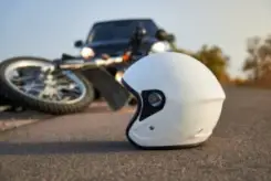close-up-of-helmet-on-the-ground-after-a-motorcycle-crash