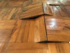floor tiles peeling up