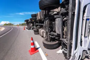 overturned truck with cone