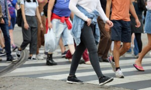 people crossing busy crosswalk