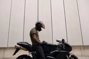 biker sitting on motorcycle