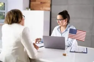 immigration lawyer with client