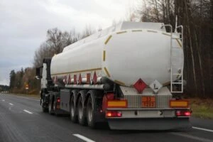 Tanker truck on a suburban road. What does a truck accident lawyer do?