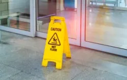 "Caution wet floor" sign in mall.