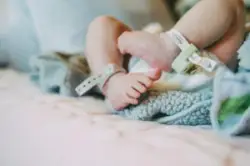 An image of a newborn baby's feet