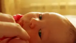 A baby looking sideways