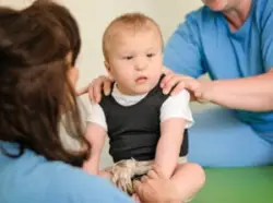 A child with Erbs Palsy in physical therapy