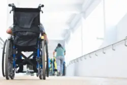 A wheelchair in a hospital hallway