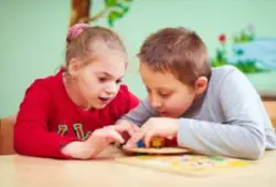 Two children with cerebral palsy playing