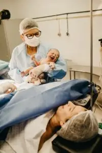 Nurse holding a newborn