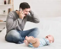 dad calls for advice for crying baby