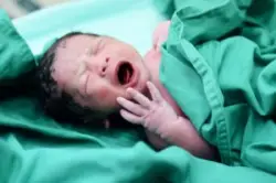 crying newborn in hospital