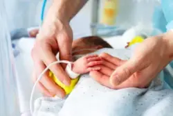 newborn-baby-sleeping-in-intensive-care-unit