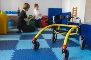 Young boy with spastic diplegic cerebral palsy