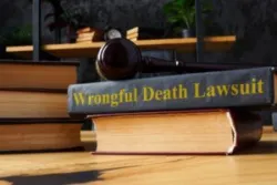 A wrongful death textbook sits on a lawyer’s desk.