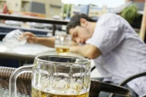 A young man passes out from alcohol poisoning after undergoing campus hazing rituals.