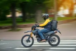 food delivery driver on motorcycle