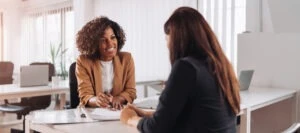 black lawyer consulting with her client