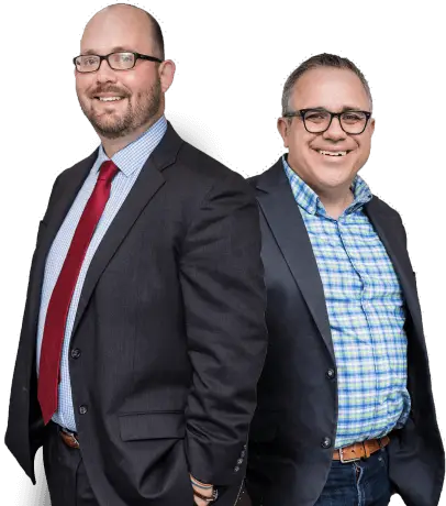 Lawyers Ryan Mckeen and Andrew Garza posing back to back and smiling - Connecticut Trial Firm Personal Injury Lawyers in