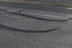 Skid marks appear on the road after a car accident. How is fault determined in a car accident?