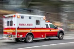 An ambulance rushes to help with a catastrophic injury. When should I contact a catastrophic injury lawyer?