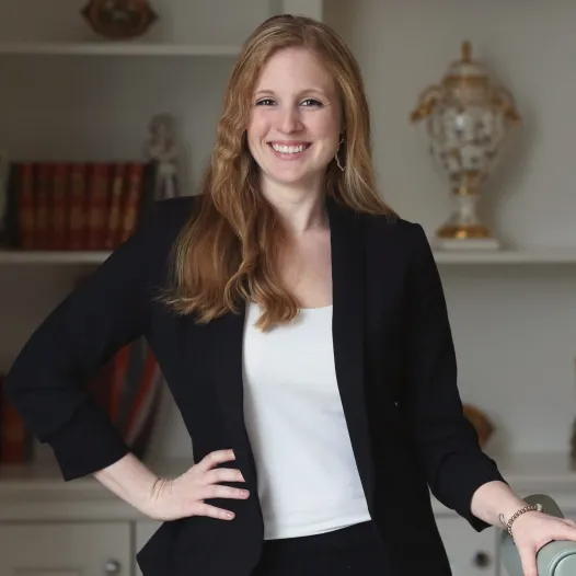 Courtney Pennell portrait: Professional headshot of Courtney Pennell, attorney at DeMayo Law, posed against a neutral background.