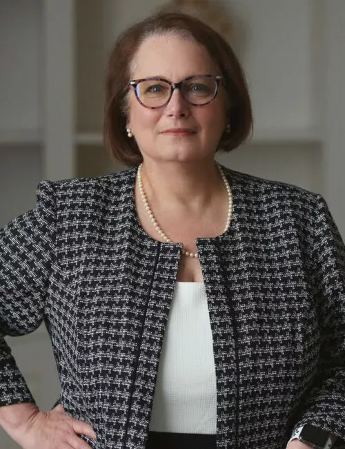 Adrienne Blocker portrait: Professional headshot of Adrienne Blocker, attorney at DeMayo Law, posed against a neutral background.