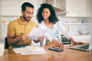 Can You Collect Long-Term Disability and Social Security at The Same Time? couple reading letter