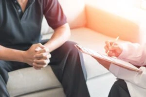 A patient talks with his doctor about erectile dysfunction (ED). The VA rating for ED is usually 0%, but veterans with an ED condition connected to their military service may be able to receive compensation. Review your options with a VA disability lawyer.