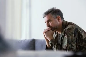 A depressed veteran considers going to the VA hospital to get a VA rating for depression. He may qualify for benefits.