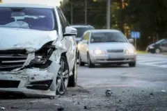 A Severely Damaged Car After A Hit And Run Accident