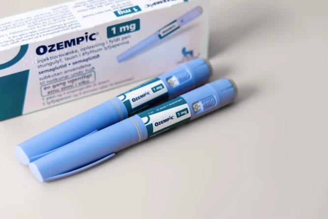 White box with two blue ozempic medication injections.