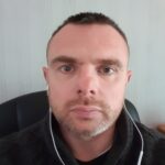 Picture of man staring directly at camera