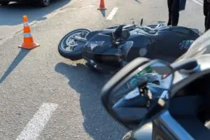 motorcycle accident in middle of road