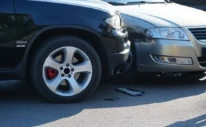 black car hitting silver car