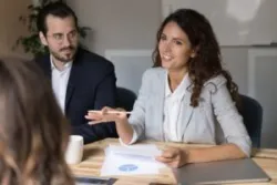 lawyer talking to her clients