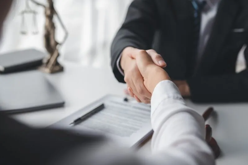 A person shaking hands with a Rock Hill personal injury attorney.