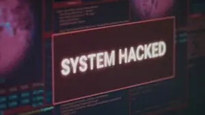computer-monitor-showing-hacked-system-alert-message-flashing-screen-dealing-with-hacking-cyber-crime-attack-display-with-security-breach-warning-malware-threat-close-up