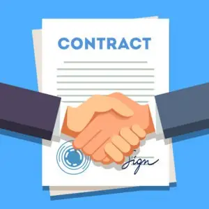 Business man shaking hands over a signed contract