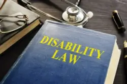 disability lawbook with stethoscope